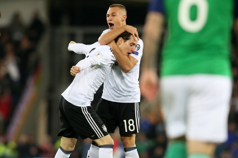 魯迪（左）與基米希（中）都進球，助德國獲勝提前取得世界盃門票。法新社