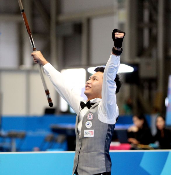 許睿安拿下男子9號球單打金牌後振臂歡呼。臺北世大運組委會／提供。