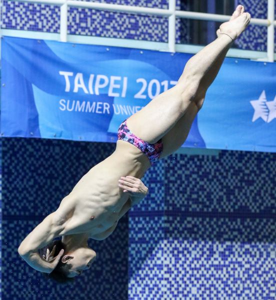 臺北世大運男子一米跳板決賽韓國KIM_Yeongnam選手跳水英姿。圖/台北世大運組委會提供