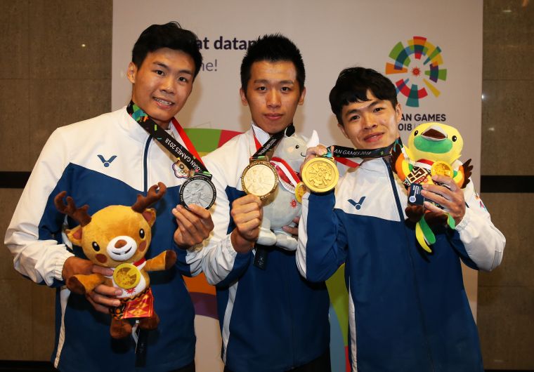 唐嘉鴻、李智凱、陳智郁(左至右)聯手締造亞運紀錄。李天助攝