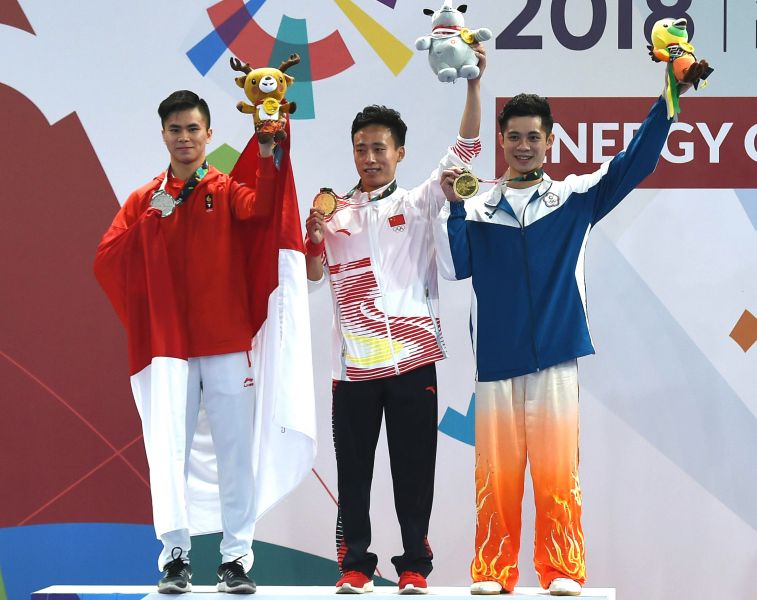 蔡澤民(右)在2018雅加達／巨港亞運武術賽長拳項目得銅。法新社。