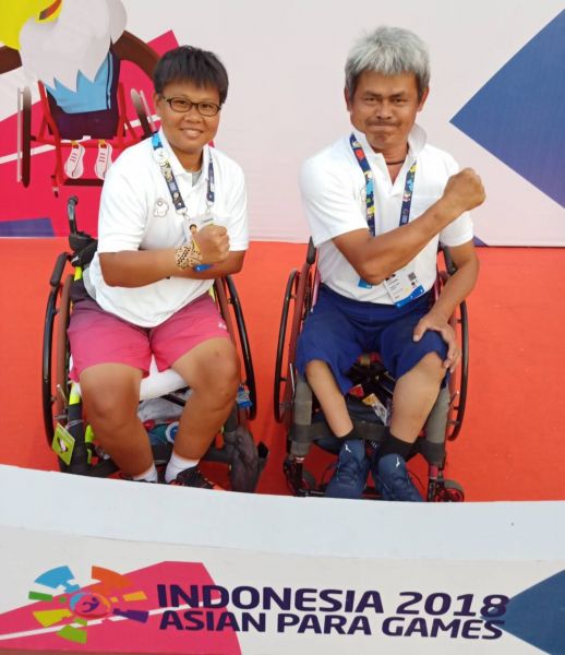 黃楚茵、黃子軒獲得2018年亞帕運輪椅網球混合雙打QUAD組銅牌。體育署提供
