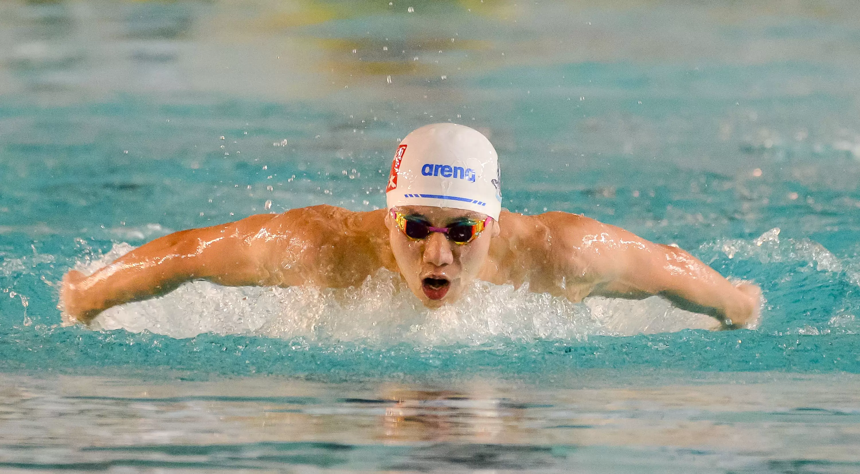 游泳公開男生組200蝶金牌臺師大王冠閎達奧運A標。大會提供
