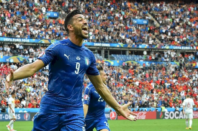 義大利淘汰兩屆冠軍西班牙，晉級八強。(AFP)