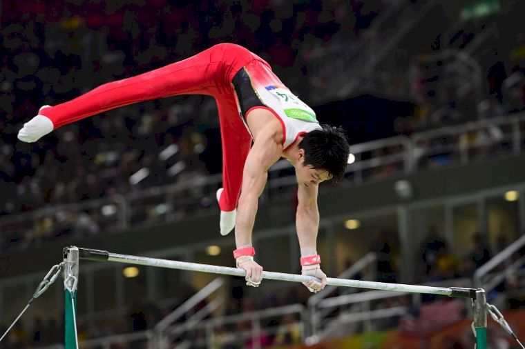 日本體操名將內村航平，雖然熱衷寶可夢，本屆里約奧運仍摘下團體、個人全能双金。法新社